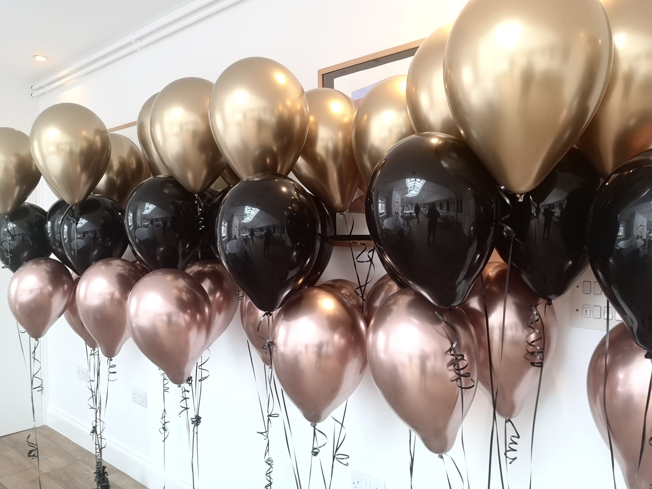 Groups of floating latex balloons