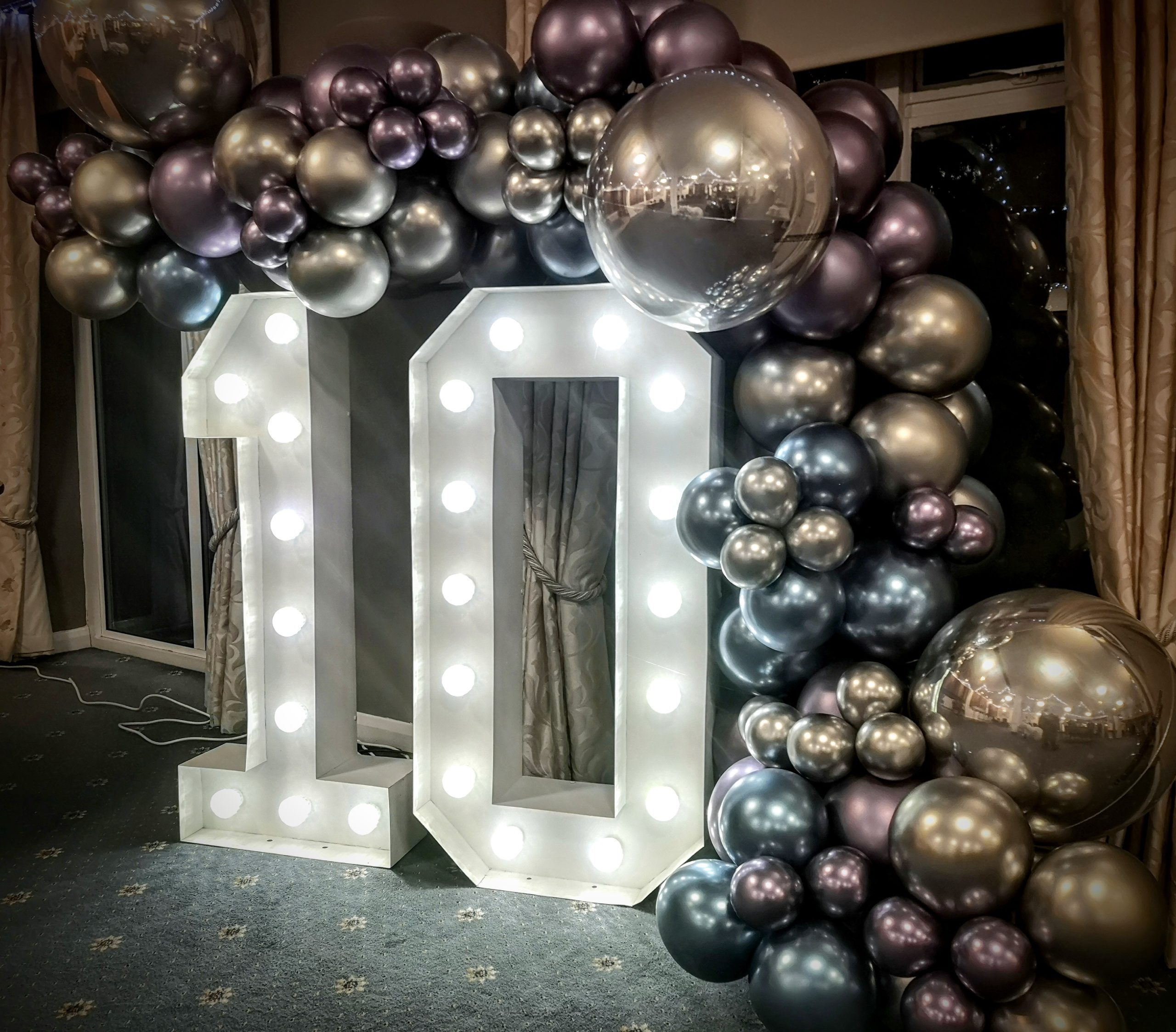 Luxury Balloon Arch over light up numbers